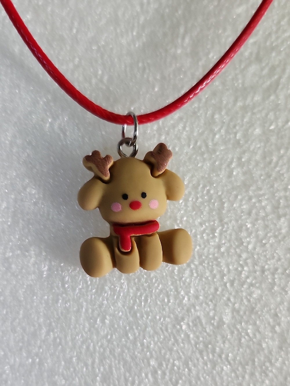 Hand Crafted Tan Reindeer Pendant Necklace with Red Cord